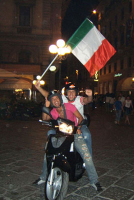 Fans on a scooter (268Wx400H) - Fans on a scooter (Photo by Danette St.Onge) 