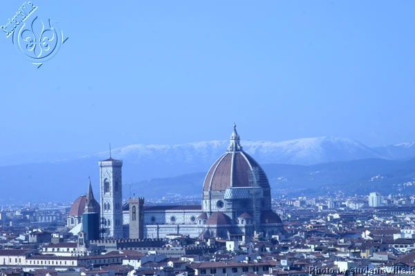 Duomo, winter time (600Wx400H) - February 2004.  Duomo of Florence with snow on the background mountains. (Photo by Marco De La Pierre) 