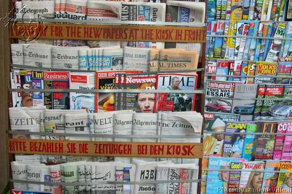 News stand (600Wx400H) - Newspapers in a news stand close to Piazza Repubblica. In the city center of Florence you can find newspapers in 15-20 different languages...(Photo by Marco De La Pierre) 